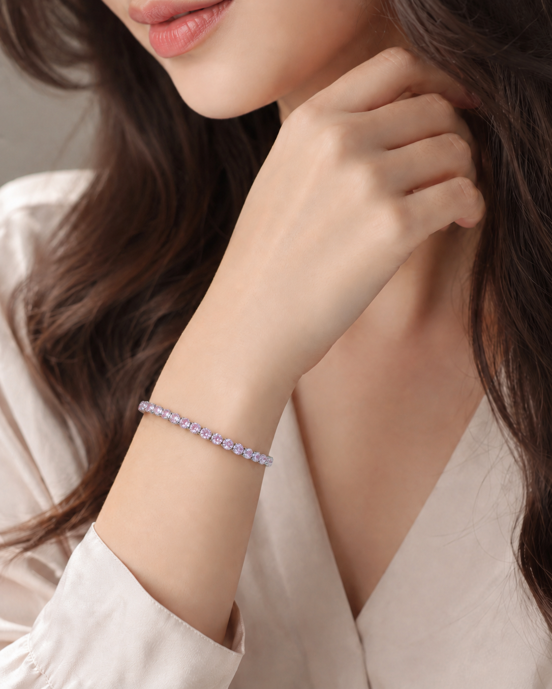 Model wearing the Blush Shimmer Bracelet with soft pink and lavender stones styled for an elegant everyday look.