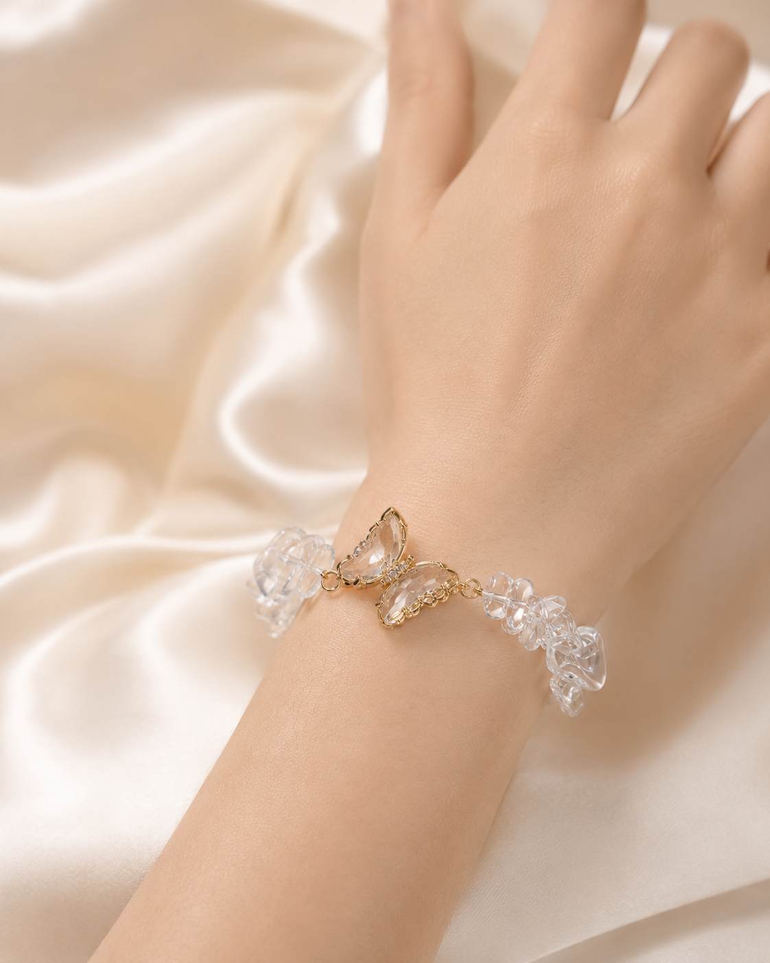 Crystal Butterfly Bracelet with clear beads and butterfly centerpiece worn on wrist.