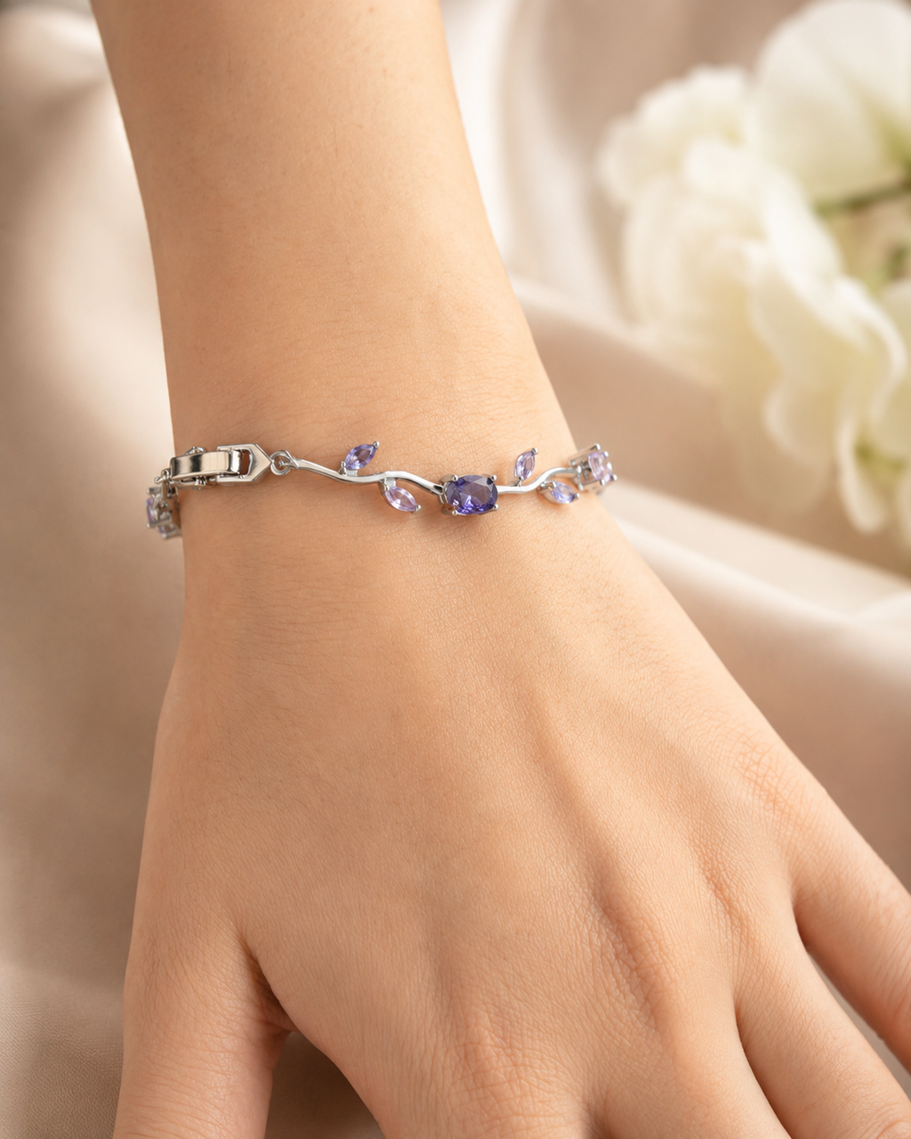 Lavender Bloom Bracelet with silver-tone vine design and pastel gemstone accents worn on wrist.